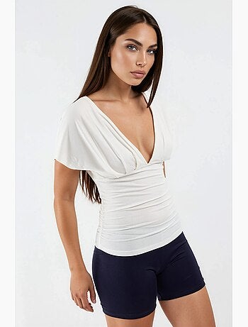 Blusa con cuello en v y detalle de lazo busem