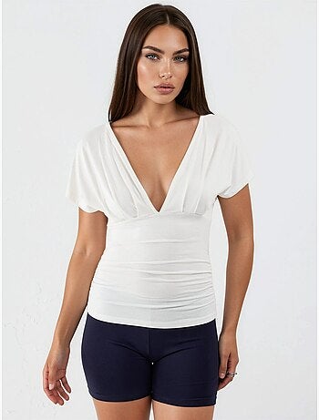 Blusa con cuello en v y detalle de lazo busem