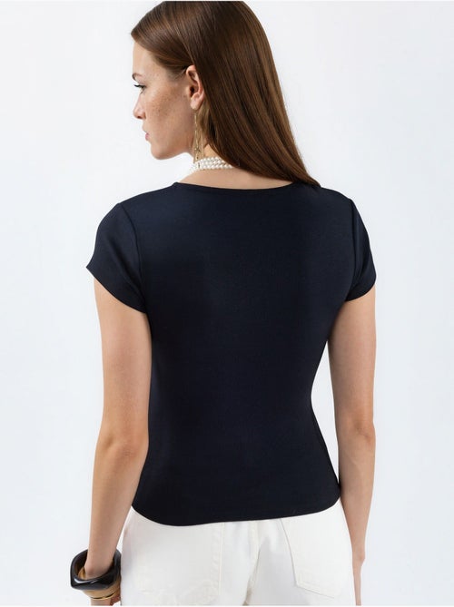 Blusa con escote en v de mezcla de modal y algodón busem - Kiabi Blusa con escote en v de mezcla de modal y algodón busem - Kiabi