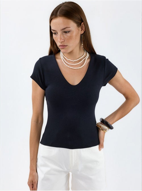 Blusa con escote en v de mezcla de modal y algodón busem - Kiabi Blusa con escote en v de mezcla de modal y algodón busem - Kiabi