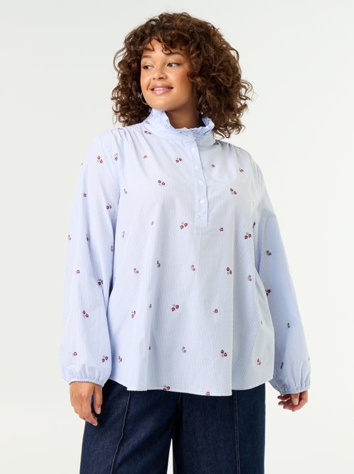 Blusa con flores bordadas y cuello alto - Kiabi