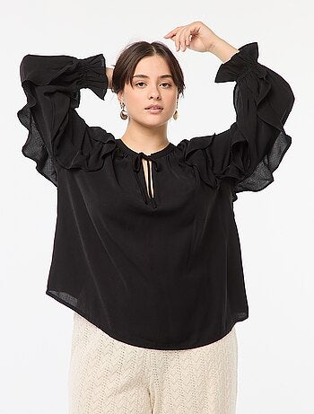 Blusa con hombros y puños con volantes + cintas anudables en el cuello