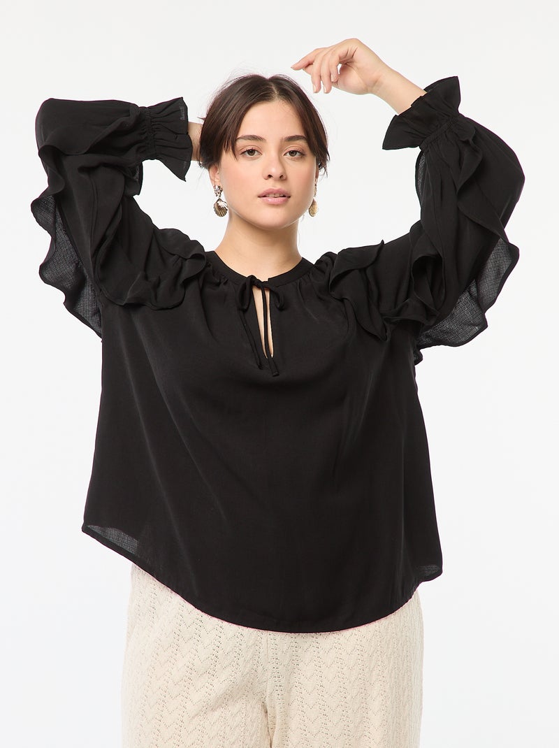 Blusa con hombros y puños con volantes + cintas anudables en el cuello negro - Kiabi