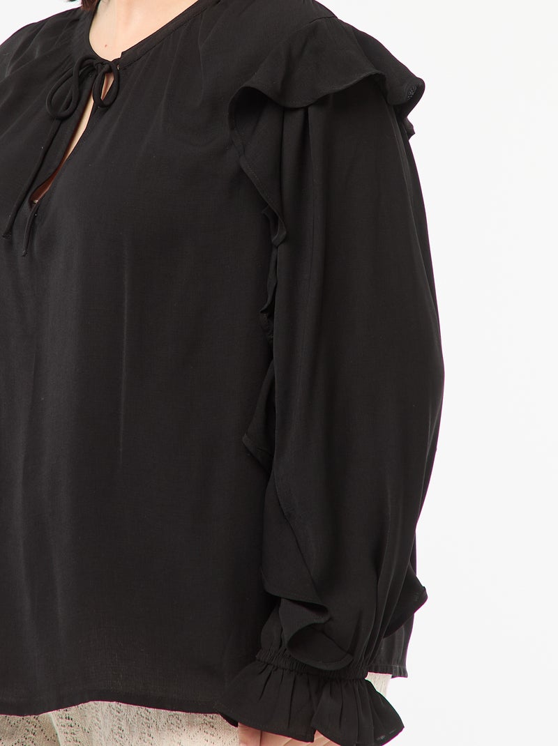 Blusa con hombros y puños con volantes + cintas anudables en el cuello negro - Kiabi