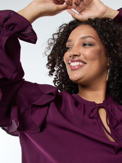 Blusa con hombros y puños con volantes + cintas anudables en el cuello - Kiabi