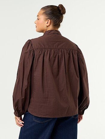 Blusa con mangas abullonadas