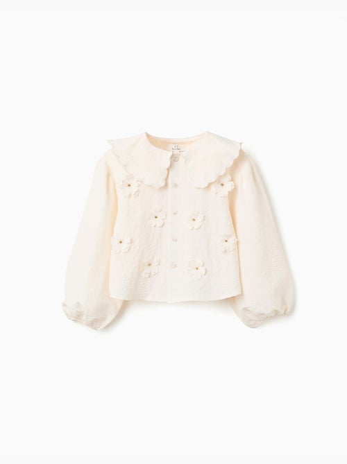 Blusa con mangas abullonadas y aplique floral - Kiabi