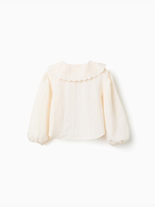 Blusa con mangas abullonadas y aplique floral - Kiabi