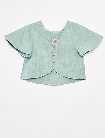 Blusa con motivos bordados