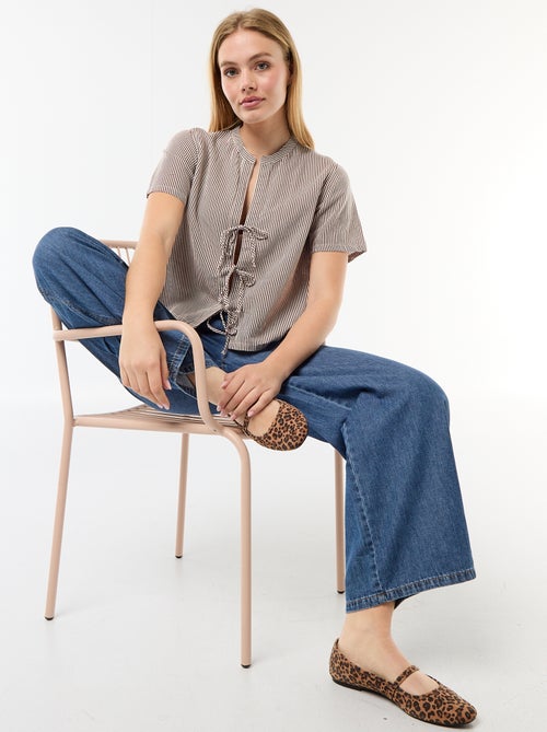 Blusa con nudos - Kiabi