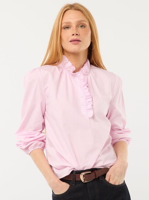 Blusa con volantes en el cuello y en la abertura - Kiabi Blusa con volantes en el cuello y en la abertura - Kiabi