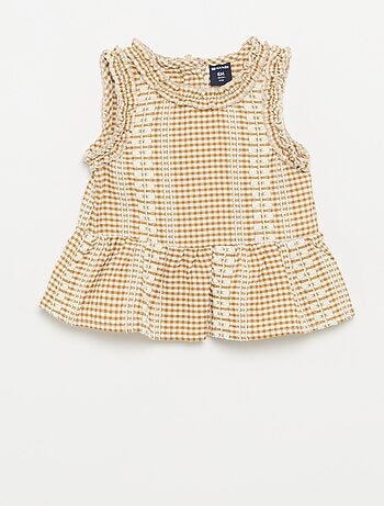Blusa con volantes en las sisas