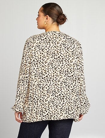 Blusa con volantes y cintas