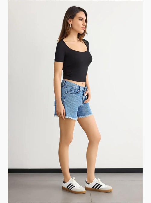 Blusa corta acanalada con cuello redondo hiccup - Kiabi Blusa corta acanalada con cuello redondo hiccup - Kiabi