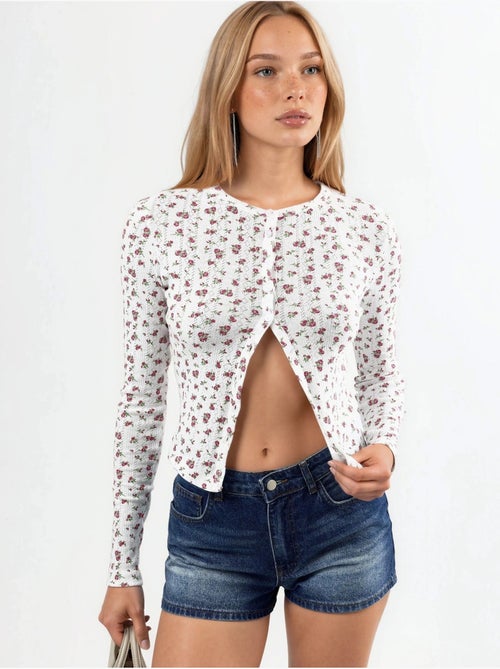 Blusa corta acanalada de flores con cierre de botones busem - Kiabi Blusa corta acanalada de flores con cierre de botones busem - Kiabi
