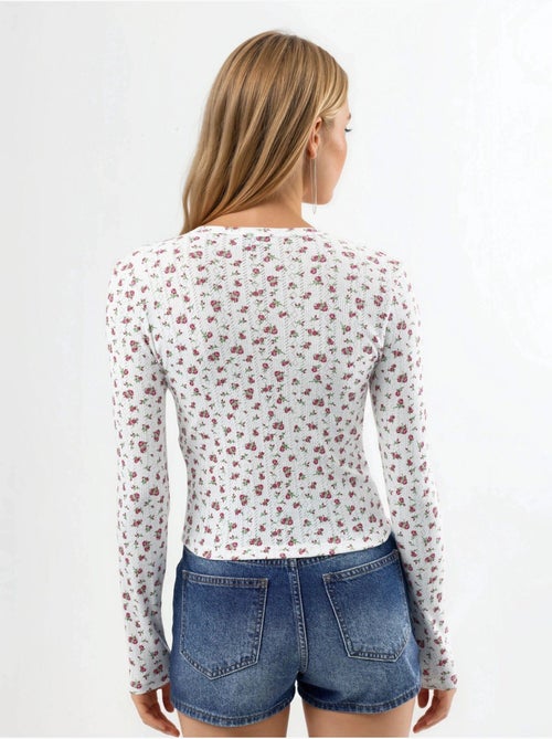 Blusa corta acanalada de flores con cierre de botones busem - Kiabi Blusa corta acanalada de flores con cierre de botones busem - Kiabi