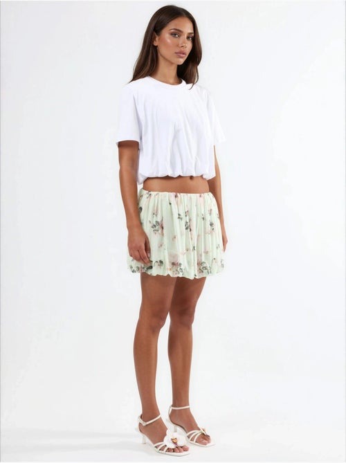 Blusa corta con cuello redondo y elástico busem - Kiabi Blusa corta con cuello redondo y elástico busem - Kiabi