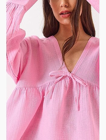 Blusa corta texturizada escote en v con lazo lucci