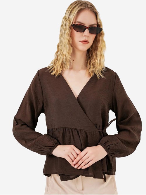 Blusa cruzada de crepé con escote en v y detalle de lazo bdart - Kiabi Blusa cruzada de crepé con escote en v y detalle de lazo bdart - Kiabi