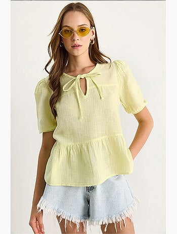 Blusa cuello redondo con detalle de lazo lucci