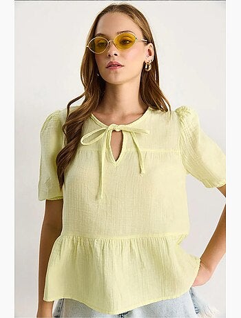Blusa cuello redondo con detalle de lazo lucci