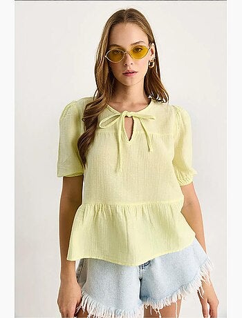 Blusa cuello redondo con detalle de lazo lucci