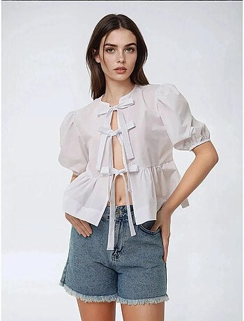Blusa de algodón con cuello redondo y detalle de lazo hiccup