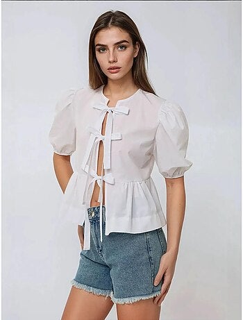 Blusa de algodón con cuello redondo y detalle de lazo hiccup