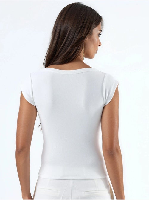 Blusa de corte ajustado acanalada con cuello en u busem - Kiabi Blusa de corte ajustado acanalada con cuello en u busem - Kiabi