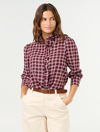 Blusa de cuello alto con volantes