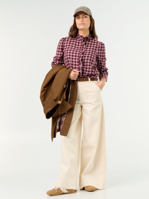 Blusa de cuello alto con volantes - Kiabi Blusa de cuello alto con volantes - Kiabi