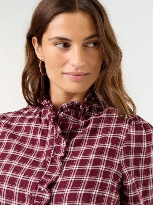 Blusa de cuello alto con volantes - Kiabi Blusa de cuello alto con volantes - Kiabi
