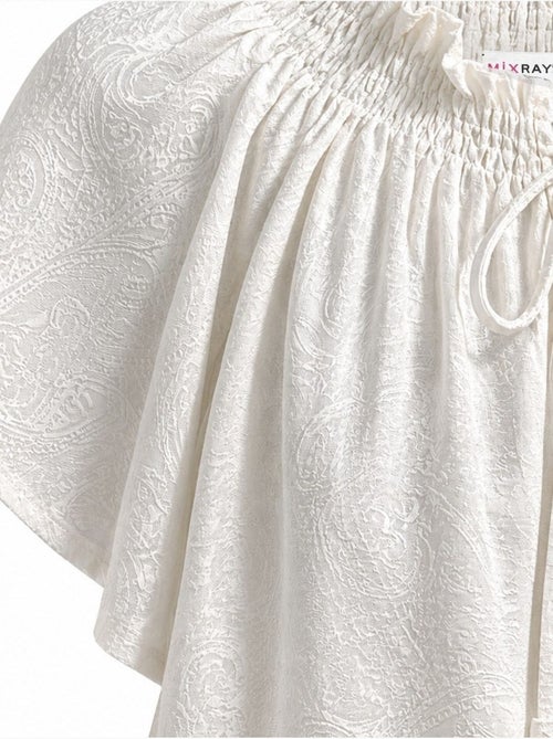 Blusa de cuello redondo con estampado paisley y detalle de lazo mixray - Kiabi Blusa de cuello redondo con estampado paisley y detalle de lazo mixray - Kiabi