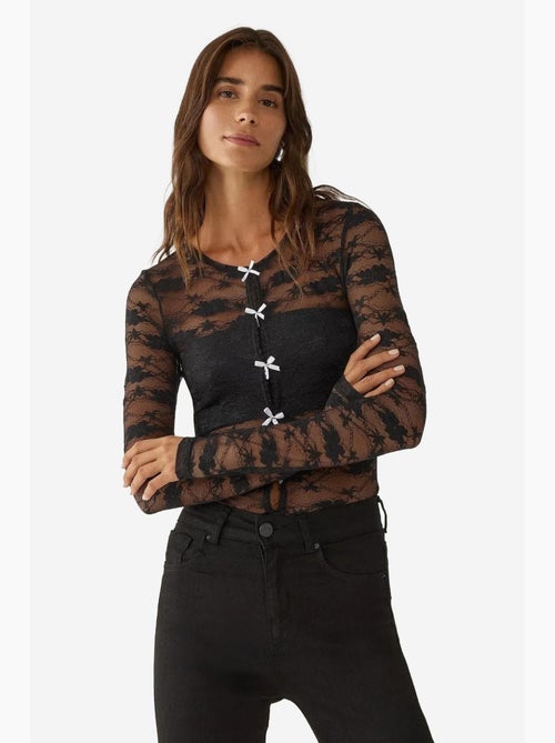 Blusa de encaje con detalle de lazo hiccup - Kiabi Blusa de encaje con detalle de lazo hiccup - Kiabi