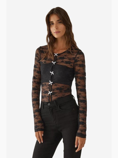 Blusa de encaje con detalle de lazo hiccup - Kiabi Blusa de encaje con detalle de lazo hiccup - Kiabi