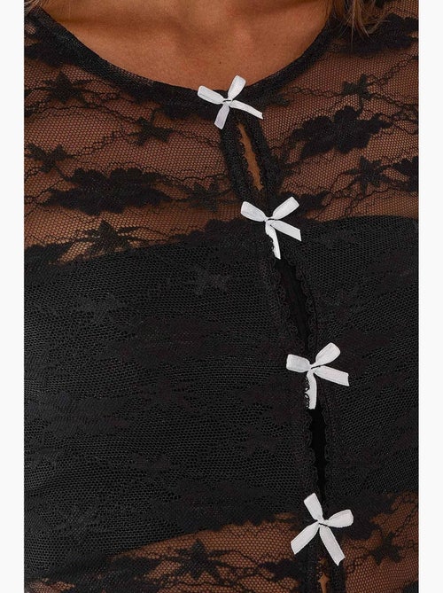 Blusa de encaje con detalle de lazo hiccup - Kiabi Blusa de encaje con detalle de lazo hiccup - Kiabi