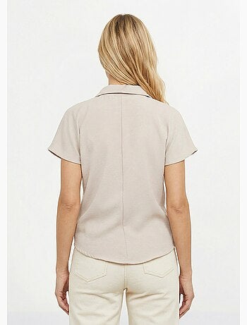 Blusa de manga corta, atada a la cintura. - Afibel