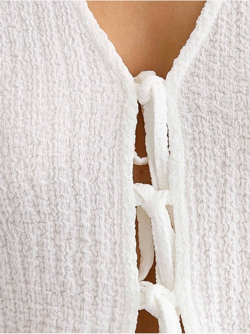Blusa de manga corta con detalle de lazo - Kiabi Blusa de manga corta con detalle de lazo - Kiabi