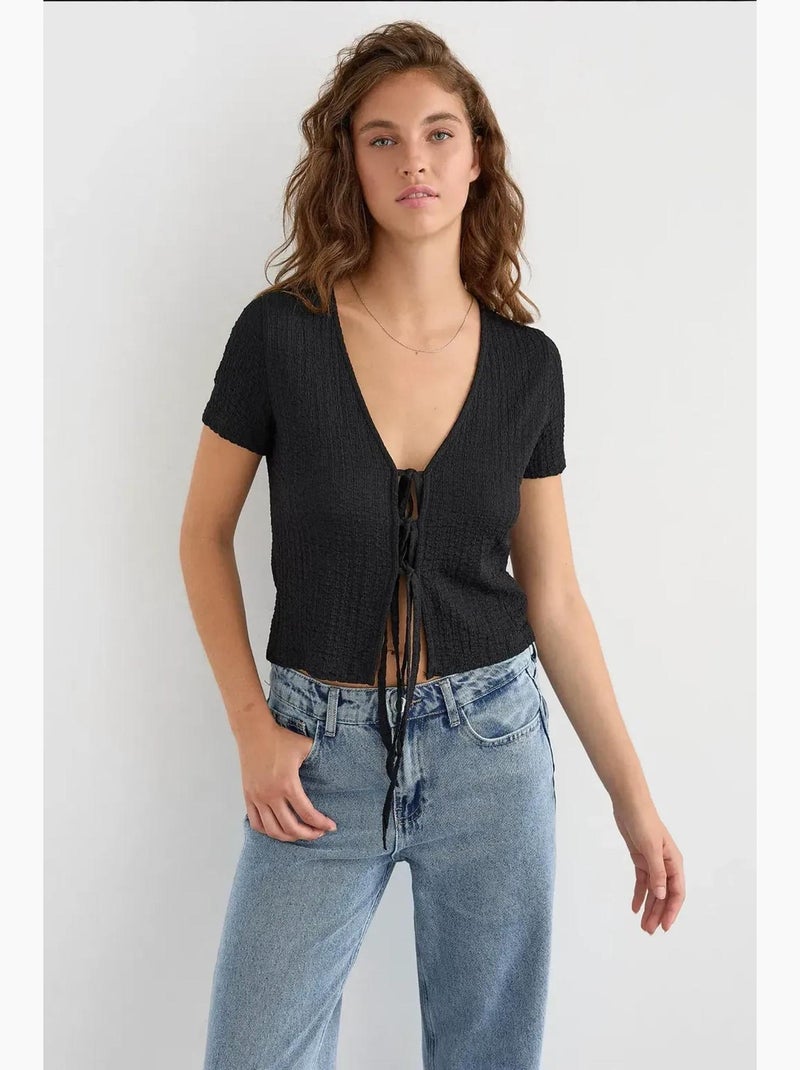 Blusa de manga corta con detalle de lazo hiccup Negro - Kiabi