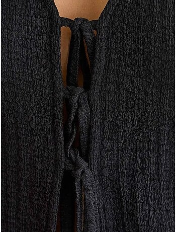 Blusa de manga corta con detalle de lazo