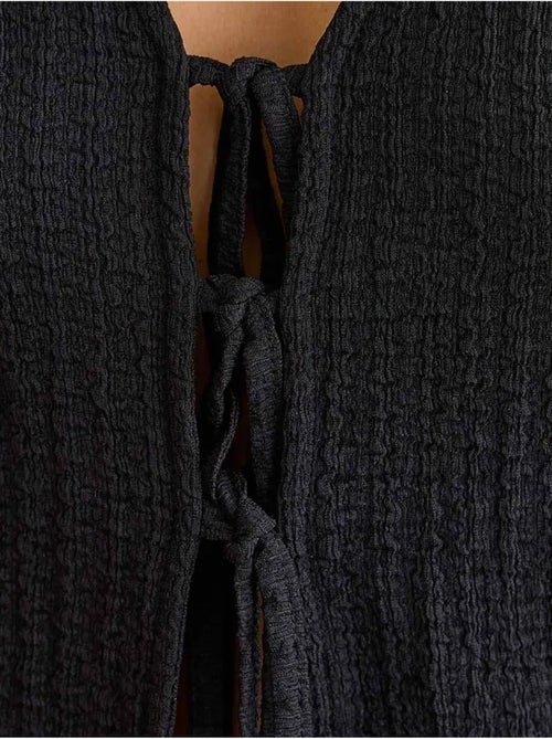 Blusa de manga corta con detalle de lazo - Kiabi Blusa de manga corta con detalle de lazo - Kiabi