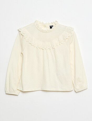 Blusa de manga larga con cuello redondo y pechera con volantes y bordados