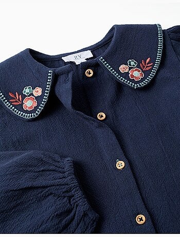 Blusa de manga larga de algodón con flores bordadas