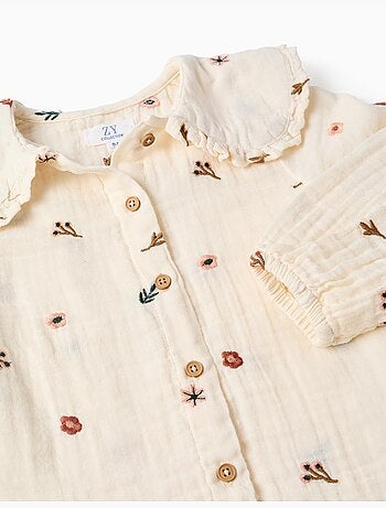 Blusa de manga larga de algodón con flores bordadas