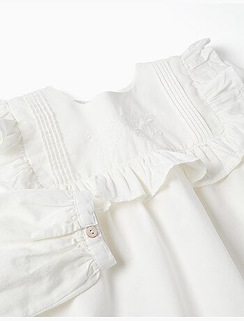 Blusa de manga larga de algodón con volantes y bordado