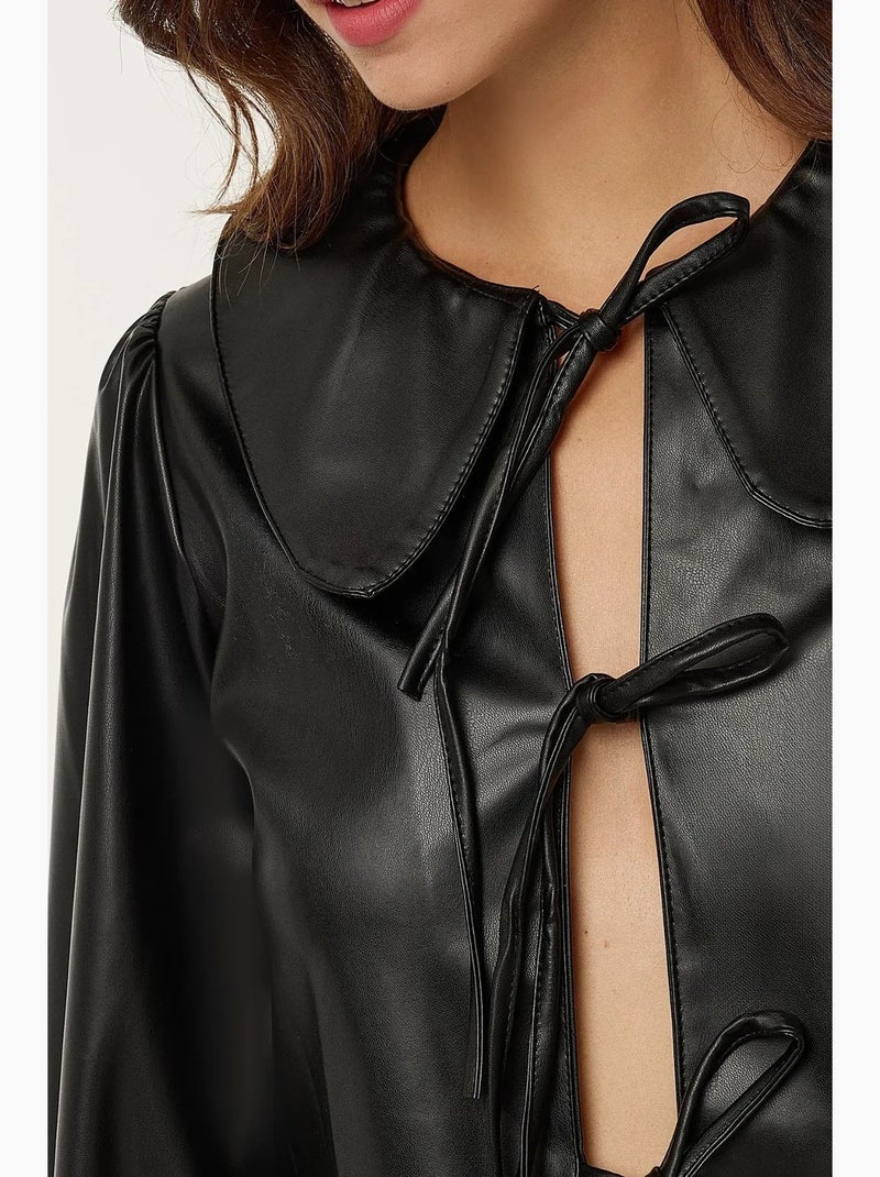 Blusa de manga larga de piel sintética con lazo hiccup Negro - Kiabi