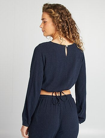 Blusa de manga larga y cuello redondo con estampado