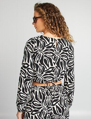 Blusa de manga larga y cuello redondo con estampado