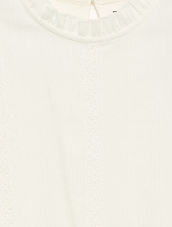 Blusa de mangas largas con cuello con volantes