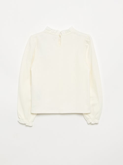 Blusa de mangas largas con cuello con volantes - Kiabi Blusa de mangas largas con cuello con volantes - Kiabi